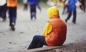 asperger-child-alone-on-playground help for asperger symptoms